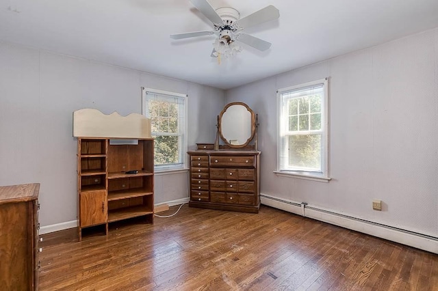 16 Miriam Dr, Attleboro, MA 02703 - bedroom with wood finished floors, multiple windows, and baseboard heating