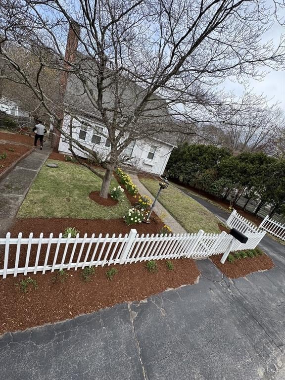 16 Miriam Dr, Attleboro, MA 02703 - obstructed view of property with a chimney