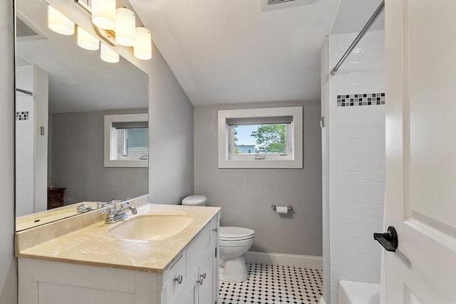 15 Hardy St Unit 2, Salem, MA 01970 - full bath featuring vanity, toilet, baseboards, bathing tub / shower combination, and tile patterned flooring
