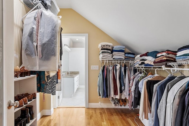 15 Hardy St Unit 2, Salem, MA 01970 - walk in closet featuring vaulted ceiling and light wood finished floors