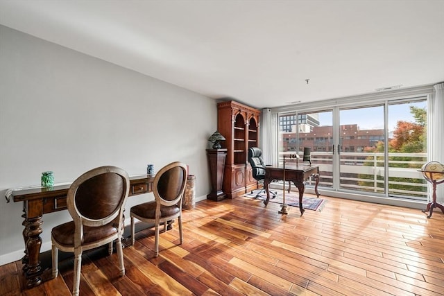 home office featuring light hardwood / wood-style floors