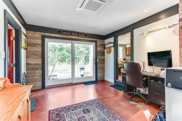 office area featuring wooden walls