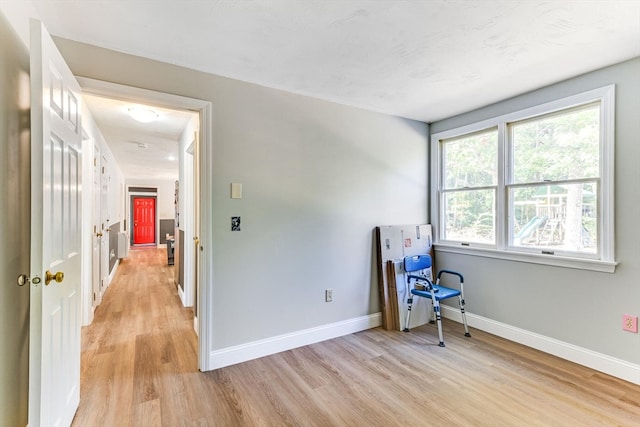 sitting room featuring light wood-type flooring