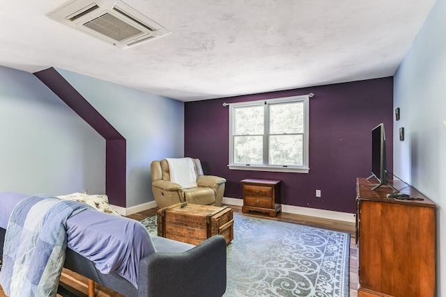 sitting room featuring hardwood / wood-style flooring