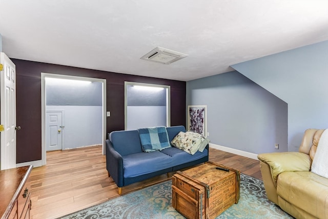 living room with light hardwood / wood-style floors