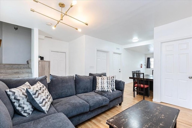 66 Hamilton St Unit 3, Leominster, MA 01453 - living room featuring stairs and light wood finished floors
