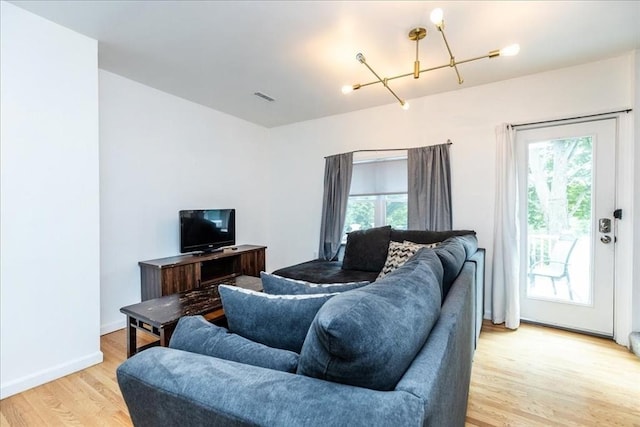 66 Hamilton St Unit 3, Leominster, MA 01453 - living room featuring light wood-type flooring, plenty of natural light, and baseboards