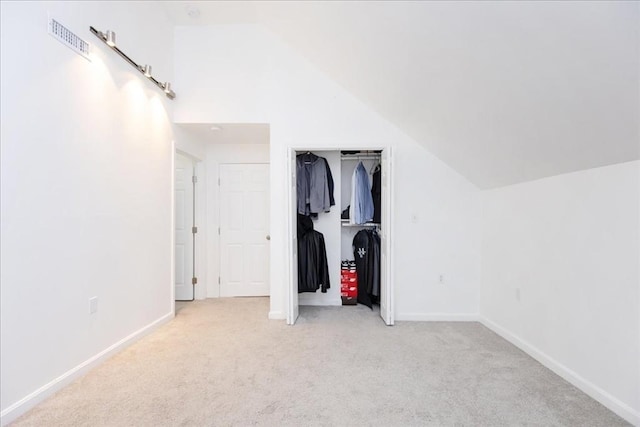 66 Hamilton St Unit 3, Leominster, MA 01453 - unfurnished bedroom with carpet floors, vaulted ceiling, baseboards, and a closet