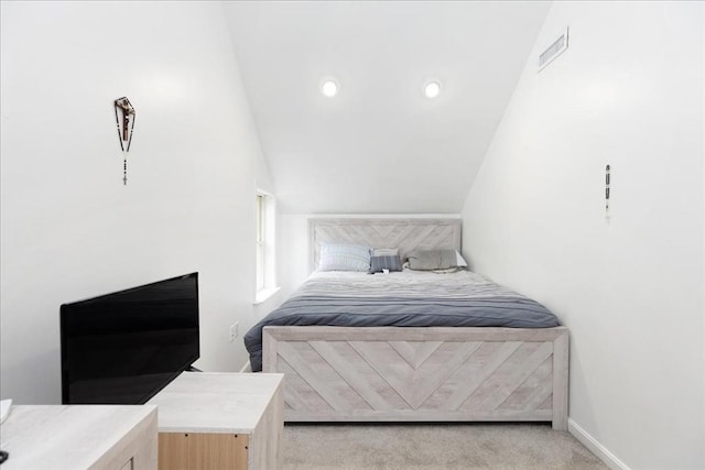 66 Hamilton St Unit 3, Leominster, MA 01453 - bedroom with light colored carpet, vaulted ceiling, and baseboards