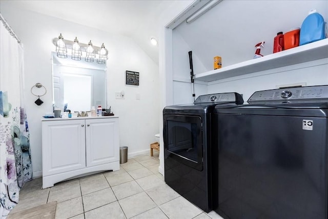 66 Hamilton St Unit 3, Leominster, MA 01453 - laundry room with washer and dryer, light tile patterned flooring, a sink, and baseboards