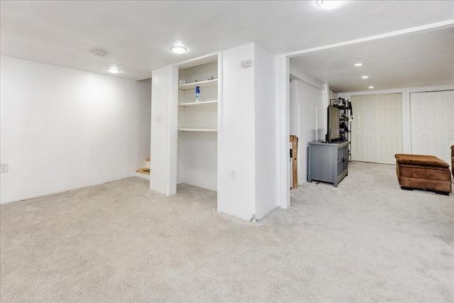 66 Hamilton St Unit 3, Leominster, MA 01453 - finished below grade area with carpet flooring, recessed lighting, and stairs