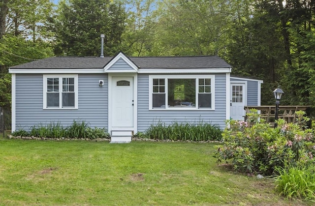 49 Lakeshore Dr, Ashburnham, MA 01430 - view of front of property with a front lawn, roof with shingles, and entry steps