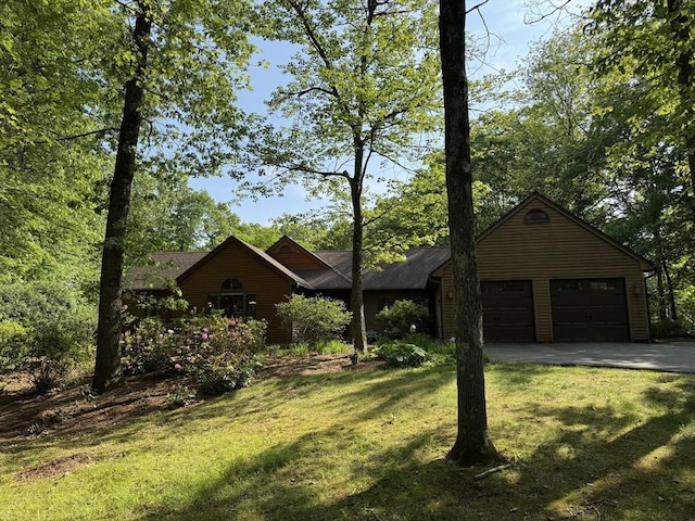 131 Sandgully Rd N, Deerfield, MA 01373 - view of front of home featuring asphalt driveway, a front yard, and a garage