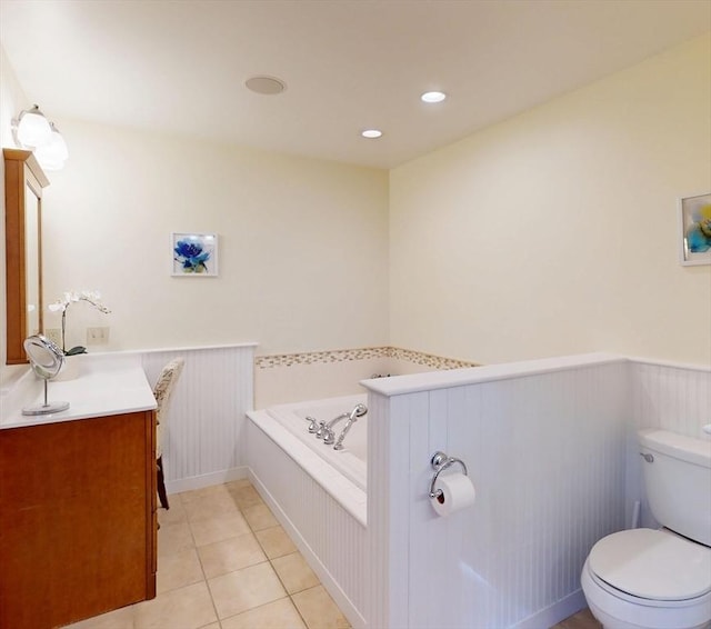 131 Sandgully Rd N, Deerfield, MA 01373 - bathroom featuring vanity, a bath, toilet, tile patterned floors, and a wainscoted wall