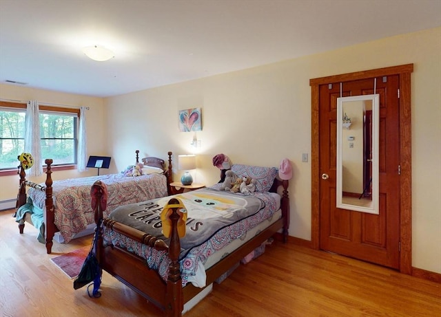 131 Sandgully Rd N, Deerfield, MA 01373 - bedroom with light wood-style flooring and baseboards