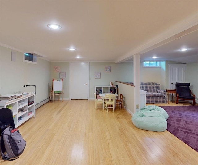 131 Sandgully Rd N, Deerfield, MA 01373 - game room with a baseboard heating unit, wood finished floors, recessed lighting, and crown molding