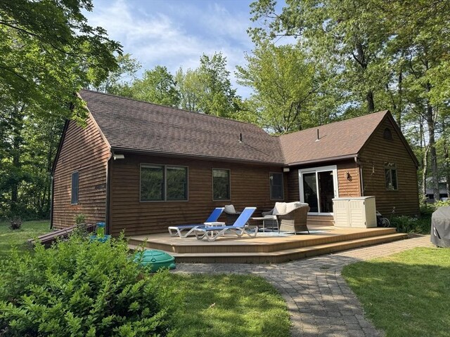 131 Sandgully Rd N, Deerfield, MA 01373 - rear view of property with a shingled roof, a yard, and a wooden deck