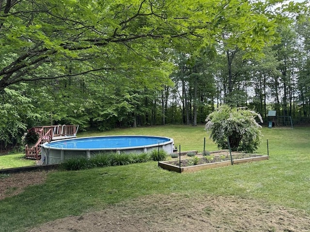 131 Sandgully Rd N, Deerfield, MA 01373 - outdoor pool with a vegetable garden and a lawn