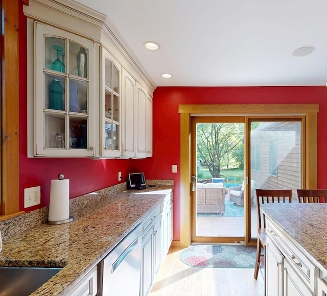 131 Sandgully Rd N, Deerfield, MA 01373 - kitchen featuring glass insert cabinets, light stone countertops, recessed lighting, light wood-type flooring, and dishwasher