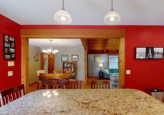 131 Sandgully Rd N, Deerfield, MA 01373 - dining area featuring a chandelier, wood finished floors, and wood ceiling with exposed beams