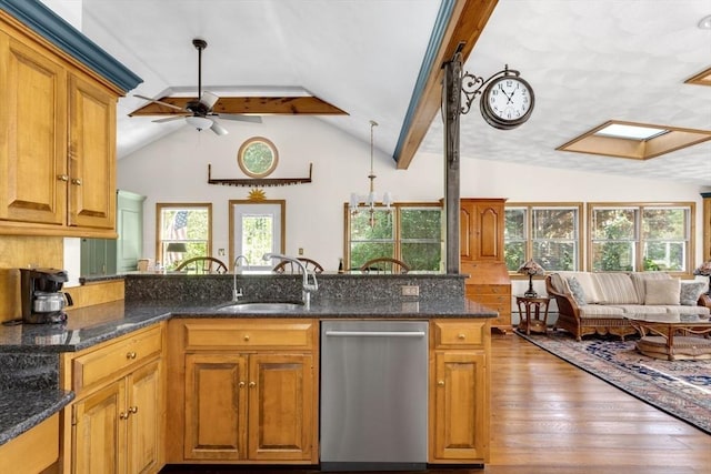 78 Daniels St, Franklin, MA 02038 - kitchen with stainless steel dishwasher, a sink, lofted ceiling, hardwood / wood-style floors, and a ceiling fan
