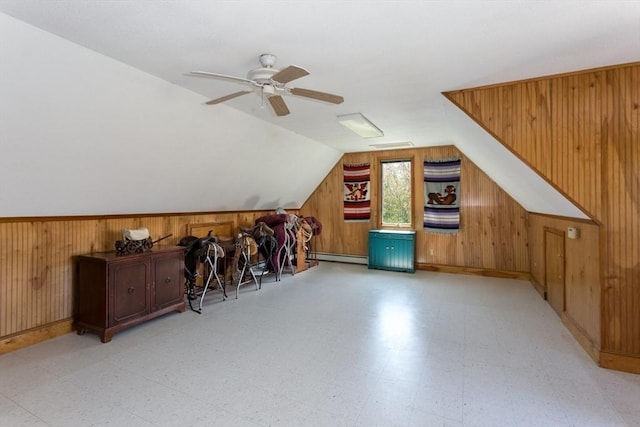 78 Daniels St, Franklin, MA 02038 - additional living space with wooden walls, tile patterned floors, a ceiling fan, lofted ceiling, and baseboard heating
