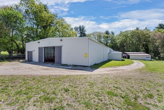 78 Daniels St, Franklin, MA 02038 - view of pole building with a lawn