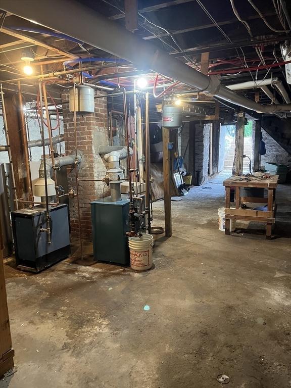 13 Elm St, Webster, MA 01550 - basement with a heating unit