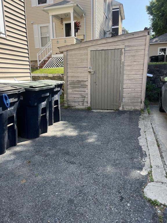 13 Elm St, Webster, MA 01550 - view of patio / terrace featuring a shed