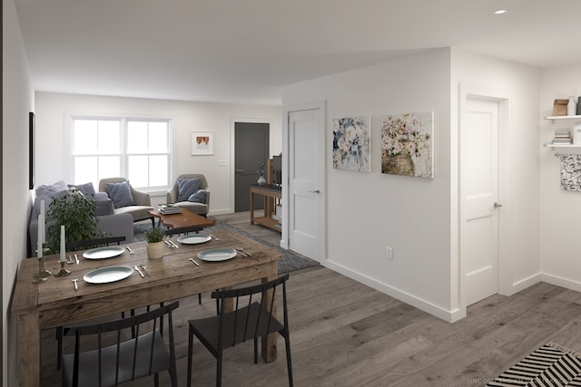 dining room with hardwood / wood-style floors