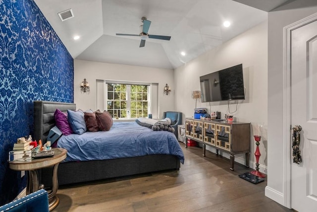 bedroom featuring vaulted ceiling, ceiling fan, and hardwood / wood-style floors