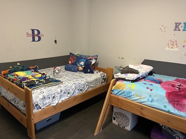 bedroom with dark wood-type flooring