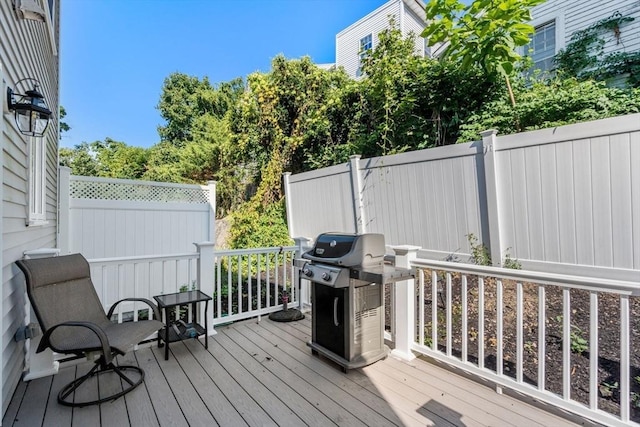 wooden terrace with grilling area