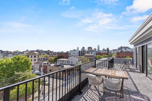 balcony featuring a city view