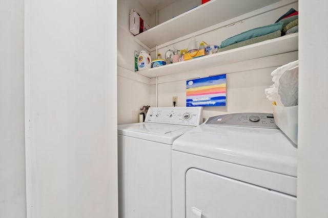 clothes washing area with independent washer and dryer