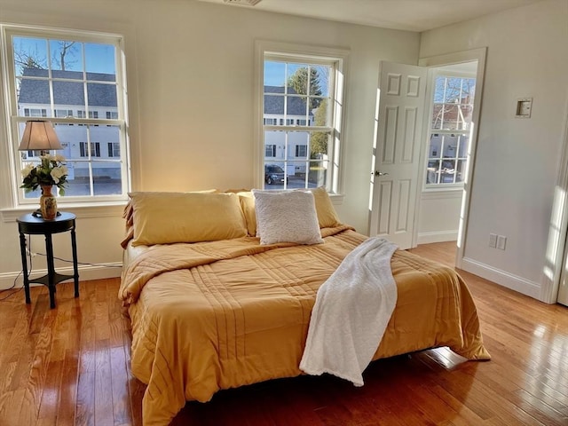 215 High St Unit 18, Taunton, MA 02780 - bedroom featuring hardwood / wood-style floors, visible vents, and baseboards