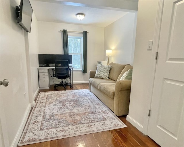 office space featuring dark wood-style floors and baseboards