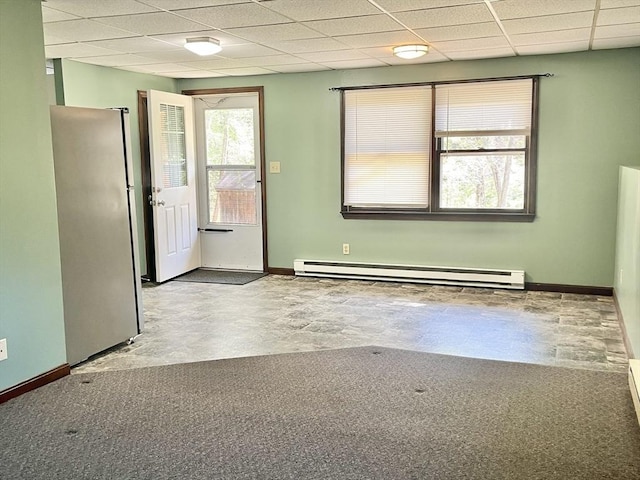 15 Old County Rd, Holland, MA 01521 - unfurnished room featuring baseboards, a paneled ceiling, and a baseboard radiator