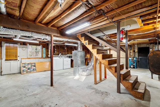 209 Pleasant, Millis, MA 02054 - basement featuring washer and dryer, oil tank, and stairway