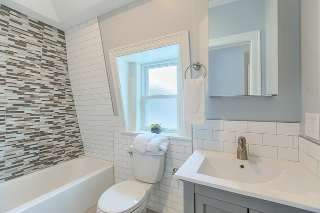 full bathroom featuring backsplash, tiled shower / bath combo, toilet, vanity, and tile walls