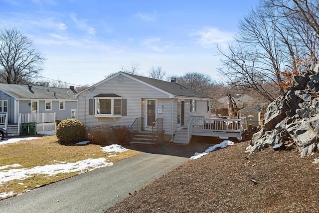 view of front of house with a deck