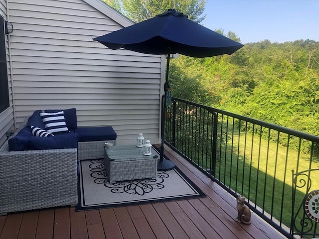 wooden deck with outdoor lounge area