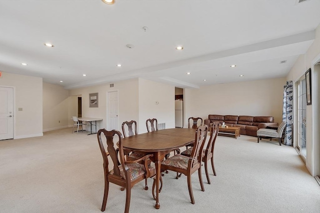 dining room featuring visible vents, recessed lighting, light colored carpet, and baseboards