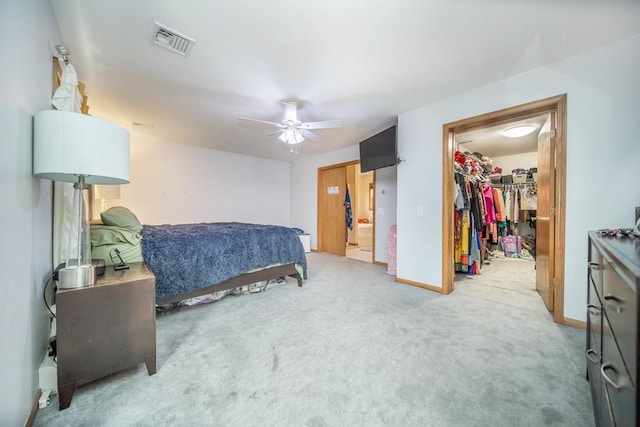 1441 Stafford Rd, Fall River, MA 02721 - bedroom featuring carpet floors, a spacious closet, a closet, baseboards, and a ceiling fan
