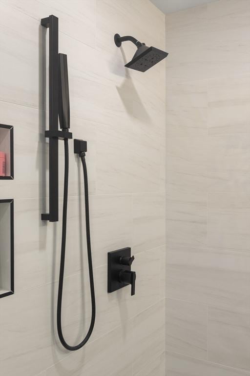 room details with a tile shower