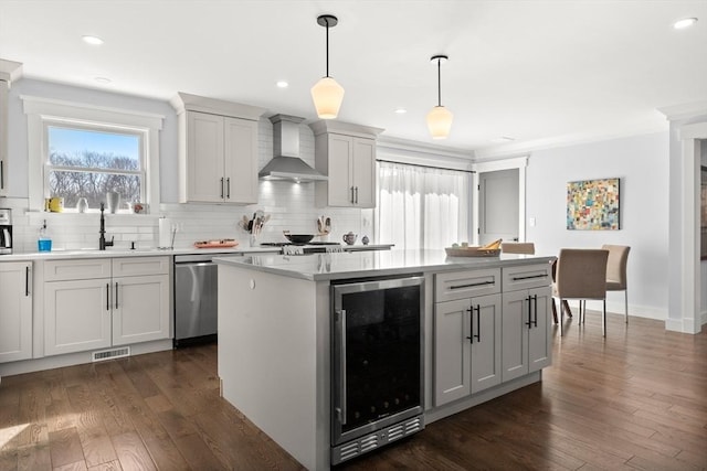 kitchen with decorative backsplash, light countertops, wine cooler, dishwasher, and wall chimney exhaust hood