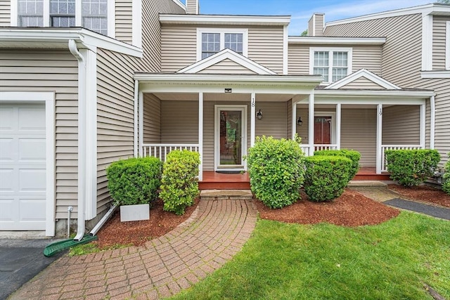 18 Hitching Post Ln Unit 18, Northborough, MA 01532 - doorway to property featuring covered porch