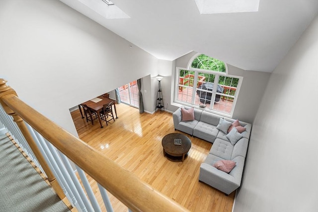 18 Hitching Post Ln Unit 18, Northborough, MA 01532 - living room with a skylight, hardwood / wood-style flooring, and lofted ceiling