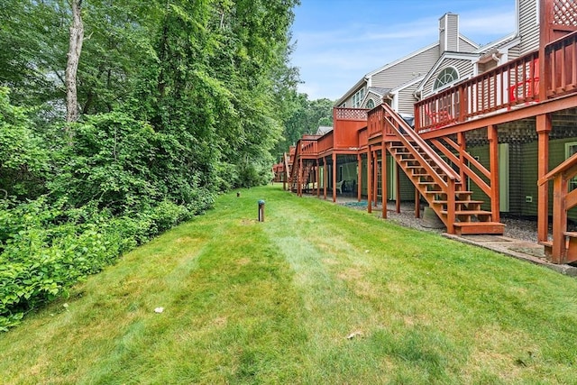 18 Hitching Post Ln Unit 18, Northborough, MA 01532 - view of green lawn with a deck and stairs