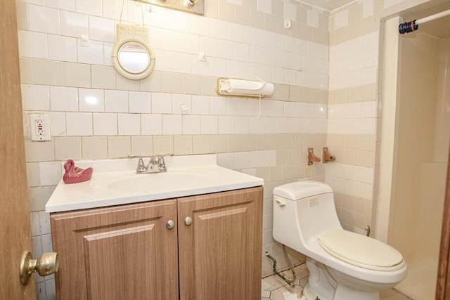 43 Huntington St, Brockton, MA 02301 - bathroom with tile walls, vanity, and toilet